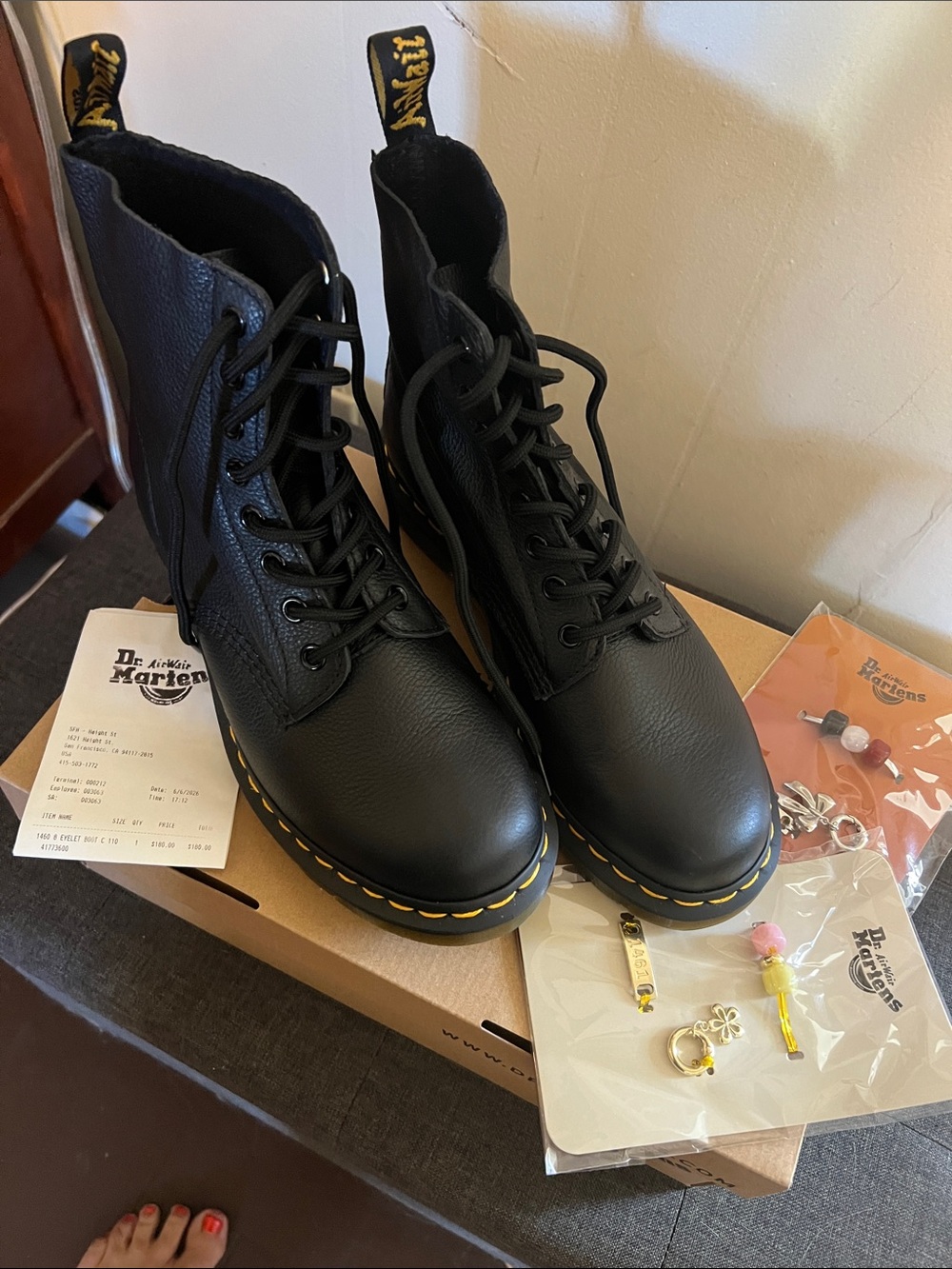 Dr. Martens Black Leather 8-Eye Lace-Up Boots with Yellow Stitching